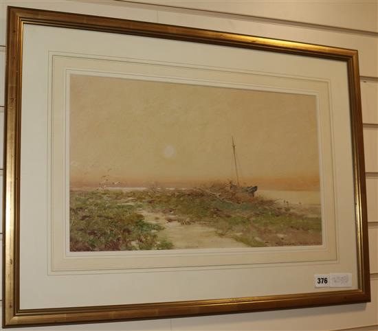 Oswald Garside (1879-1942), watercolour, estuary scene with fishing boat, signed, 28 x 47cm